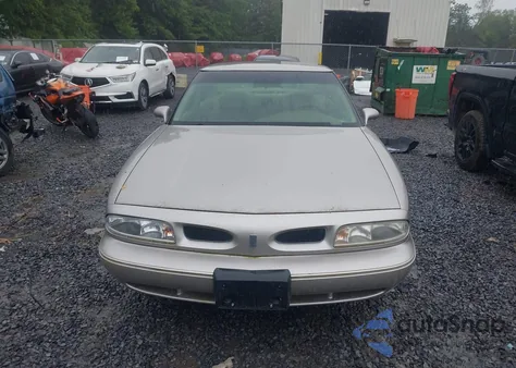 1996 Oldsmobile 88 Ls из США, поврежденный, VIN 1G3HN52K5T4820832